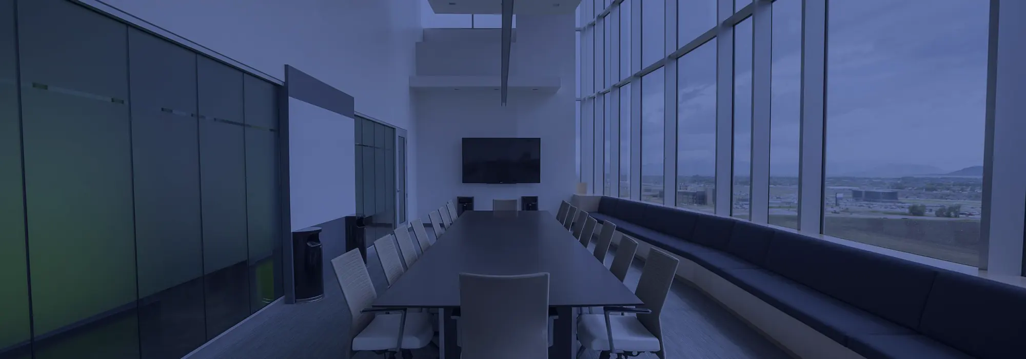 An empty boardroom set for a meeting.
